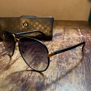 Gucci sunglasses (these glasses some wear)